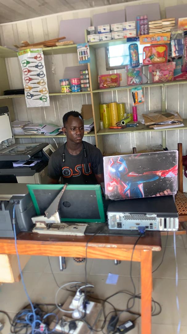 Quick Tech Solution shop and computer work area